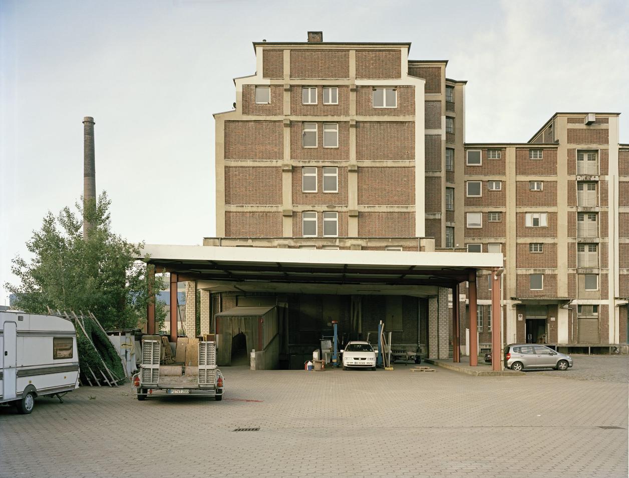 Inzwischen abgerissenes Lagergebäude, Foto: Fotografie Dorfmüller | Klier