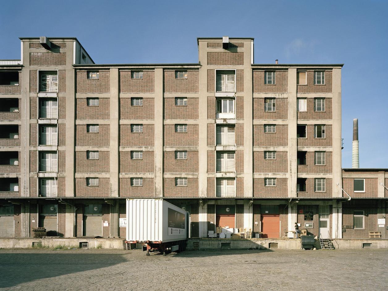 Inzwischen abgerissenes Lagergebäude, Foto: Fotografie Dorfmüller | Klier